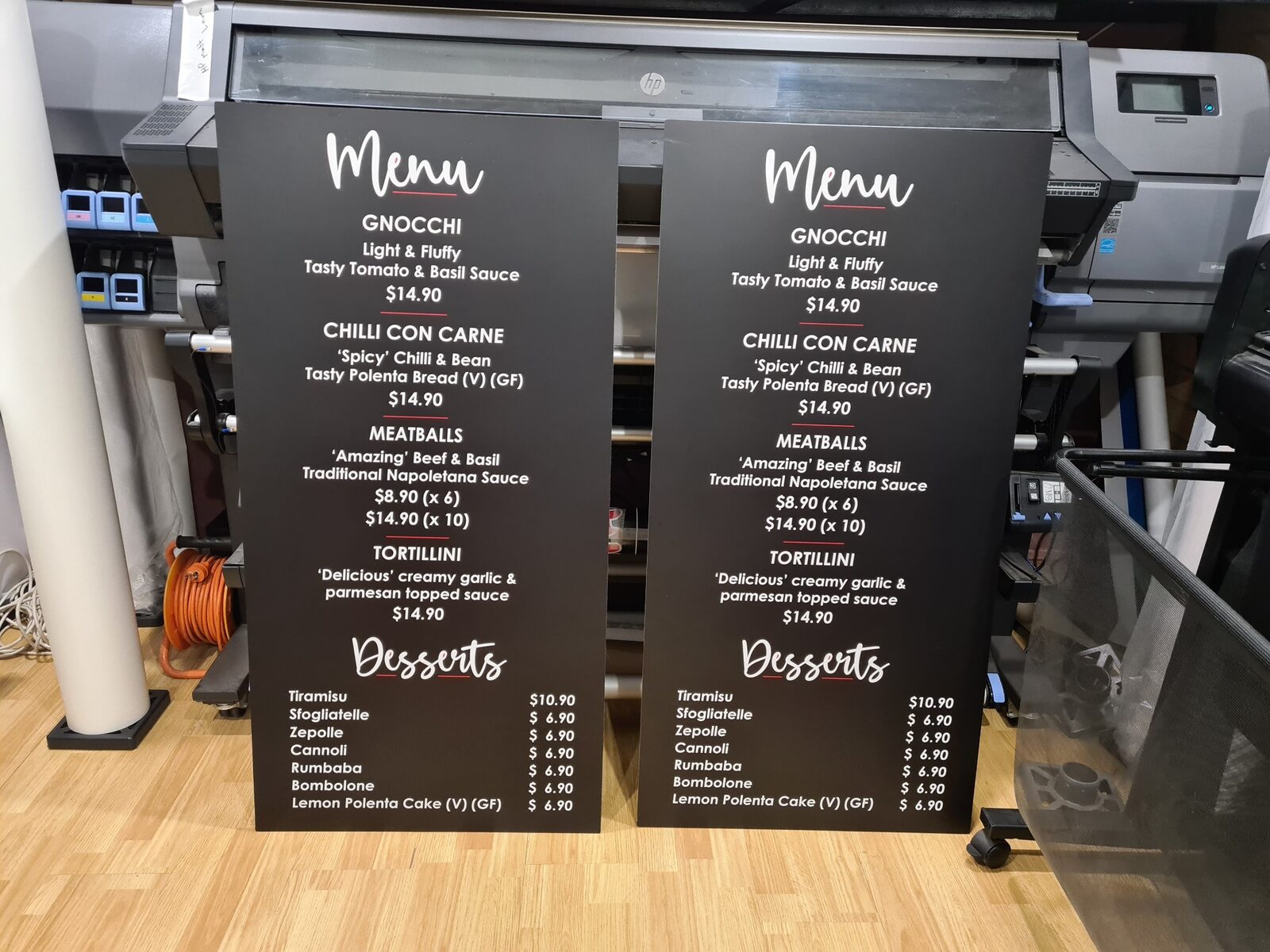 Two large black printed menu panels